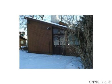 Exterior Front. Home has contemporary touches blen