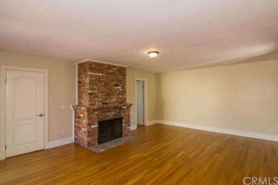 Living room with a masonry fireplace