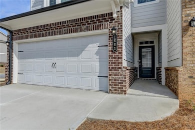 Entrance to property with a garage