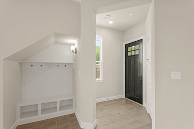 Welcoming foyer with convenient valet