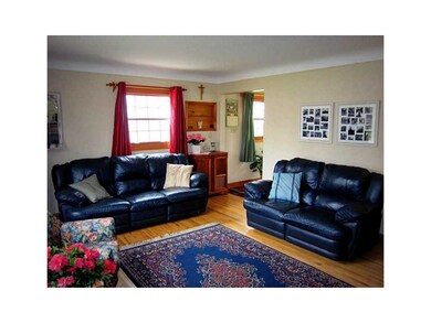 Living Room. Hardwood floors, coved ceilings