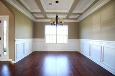 EXAMPLE>>>Gorgeous Formal Dining Room with Lots of Custom Trim, Hardwood Flooring and Coffered Ceiling!!