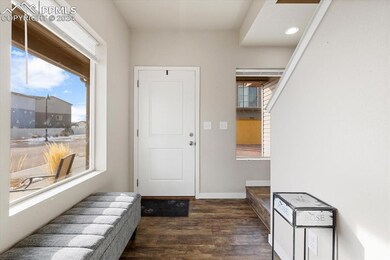 Front entry with beautiful LVP floors and stairs t