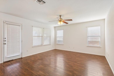 Empty room with a ceiling fan, healthy amount of 