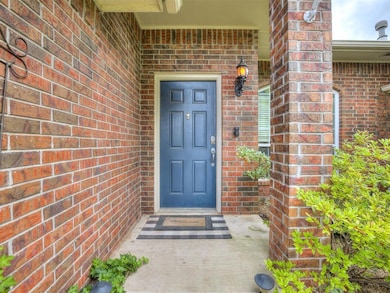 Property entrance with brick siding