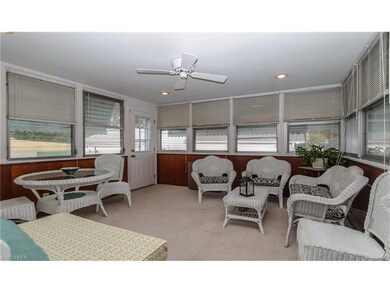 Four season sunroom with recessed lighting.