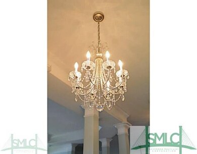 Foyer. Beautiful chandelier in foyer.