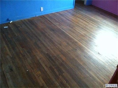 BEDROOM 1 HARDWOOD FLOOR