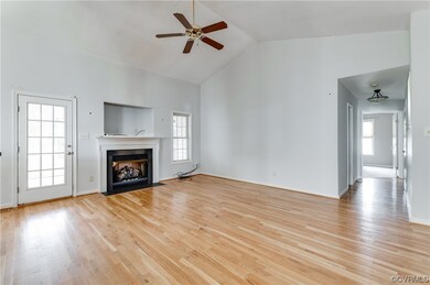 Unfurnished living room featuring a wealth of natu