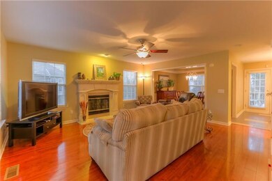 Welcoming hardwood floors, nice open floor plan, bright & sunny home!