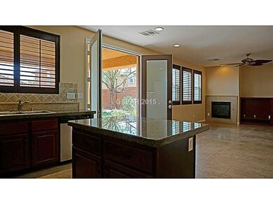 Kitchen. Family Room Opens to Covered Patio