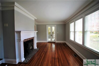 Living Room with Crown and Beautiful Hardwood Floo