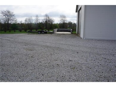 There is a concrete storage area for your mulch! H