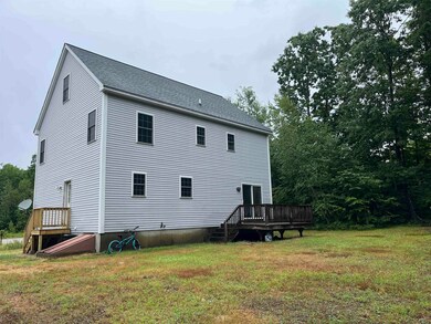 Facing the house from back yard. New side steps in
