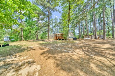 View of yard with a storage unit, an outdoor struc