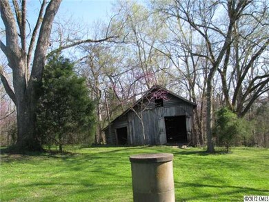 Exterior Front - Huge Pecan Tress near Tool Shed a