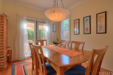 Double French doors open from formal dining room t