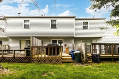 Back of the condo, deck, green space