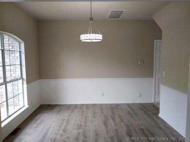 Formal Dining Room with chair railing.