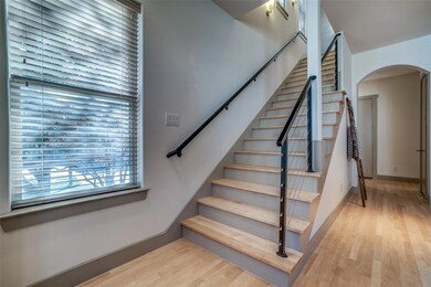 Alternate view of the entryway, showing hall to ga