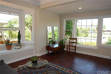 Engineered hardwood floors, and bay window.
