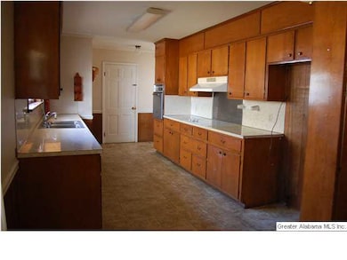 Galley kitchen with an abundance of cabinets!