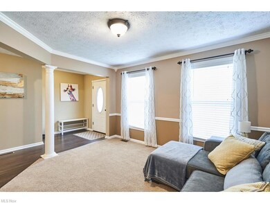 Wonderful open living room as you walk into the fo