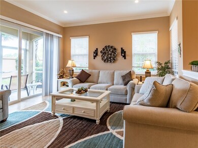 Living room opens to the West facing lanai... a great place to enjoy Southwest Florida's breathtaking sunsets!