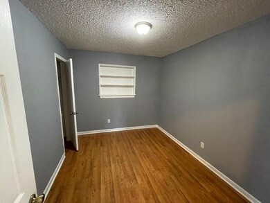 Front Bedroom w/ Built-in shelves