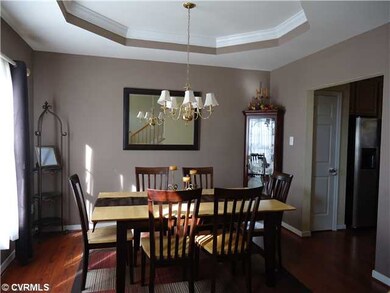 Dining Room - Formal, with tray ceiling, two sunny