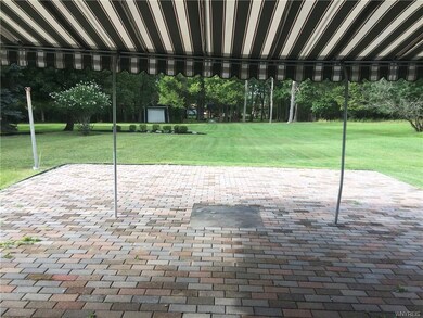 View of park-like yard from patio