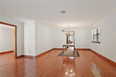 Large living room flows to dining area & leads to