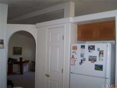 High ceilings and arches from kitchen