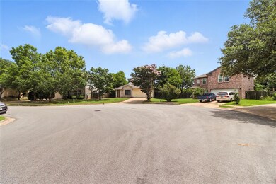 View of asphalt street featuring a residential vi