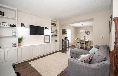 Living room provides perfect location for sitting room or play room