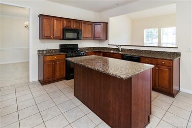 Open view from kitchen to the sunroom