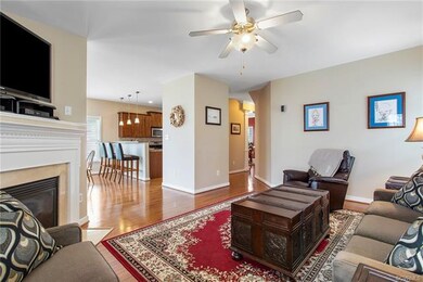 The family room is open to the eat-in breakfast nook adjacent to the kitchen.