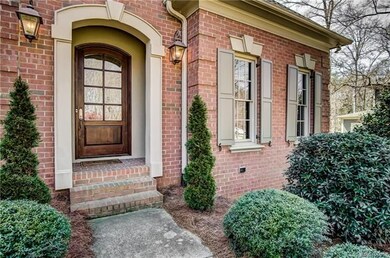 Walkway to front entrance. Gorgeous front door!
