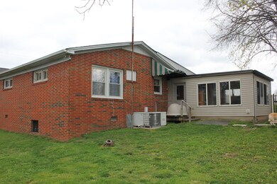 Large Sunroom on Back of Home