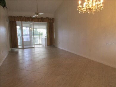 Living/Dining area looking towards the enclosed la