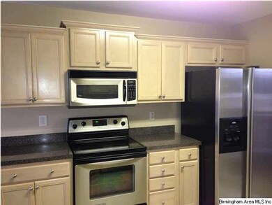 Kitchen with eat- in area.