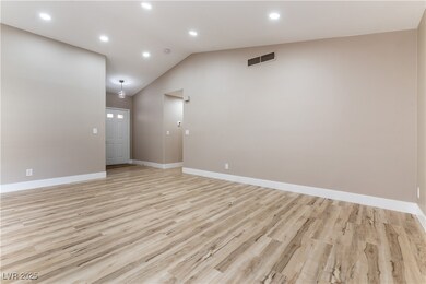 Living room with recessed lighting.