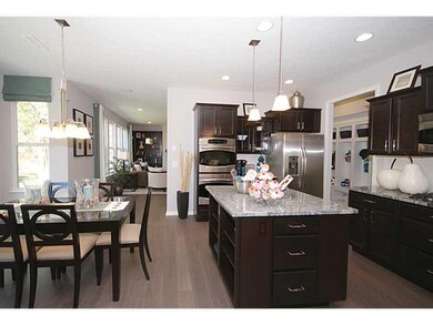 Kitchen. Home is under construction.  Photo is of a similar model.