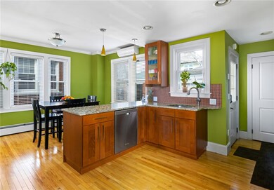Kitchen contains a closet right next to the back d
