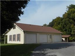 3 Car Detached Garage with large upstairs storage area