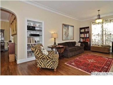 There are built-in book cases, crown molding and i