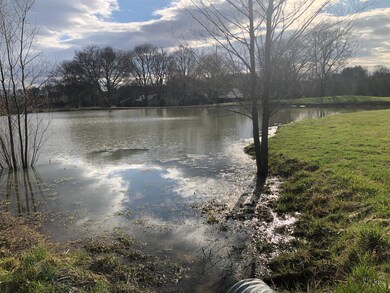 Drive by this gorgeous pond on the way to your new home. 