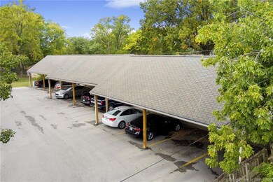 Covered parking spot G & shed.