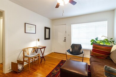 Living room featuring light wood-style flooring, 