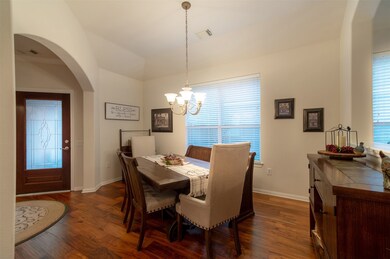 34 S Dylanshire Cir Dining room with a large window and high ceiling